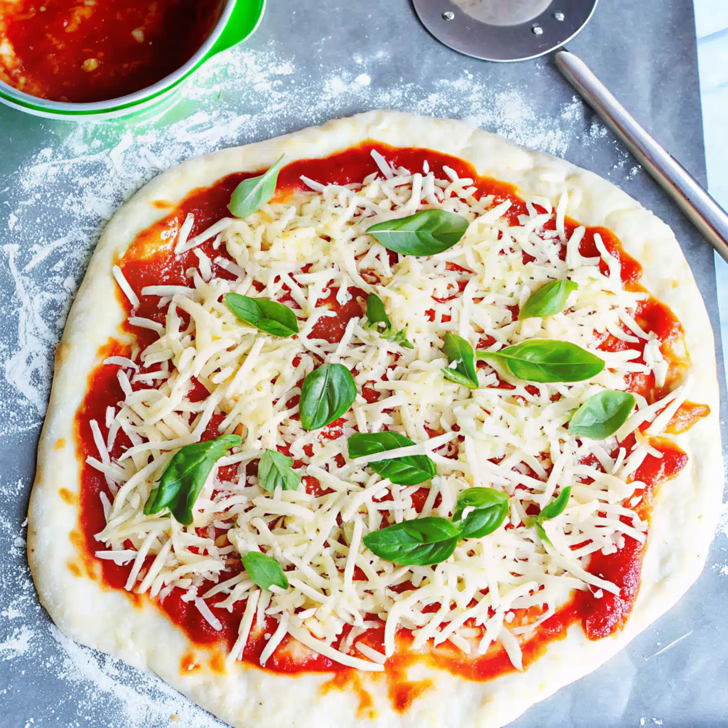 Step-by-step preparation of Easy Margherita Pizza with fresh dough and toppings